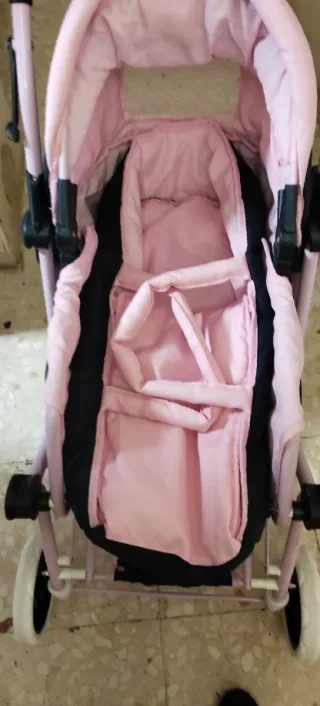 Carrito de muñecas rosa