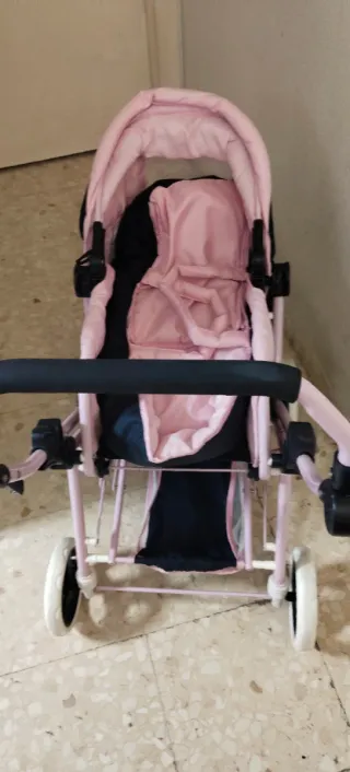 Carrito de muñecas rosa
