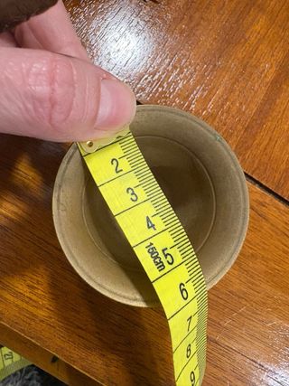 Mortero y mano di bronzo in miniatura