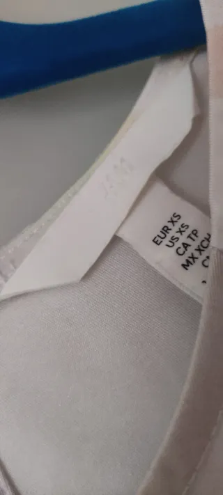 Camicia fantasia maniche svasate