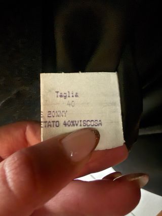 Cappotto nero con collo in pelliccia