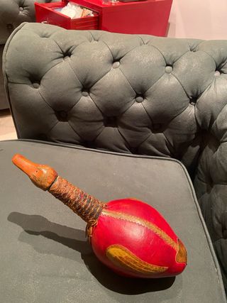 Bottiglia a forma di papera rossa