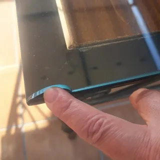 Mesa de forja con sobre de cristal