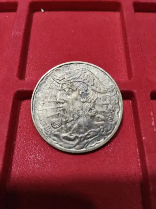 Moneda antigua con perfil