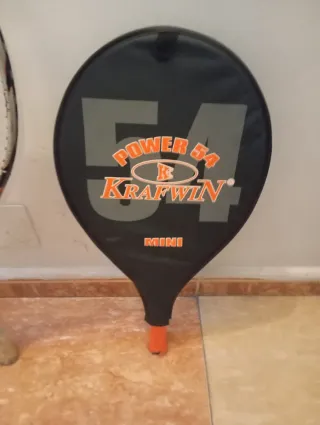 Bolsa de golf con palos y 2 raquetas