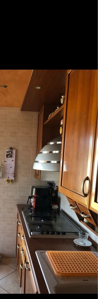 Cucina componibile in legno e metallo