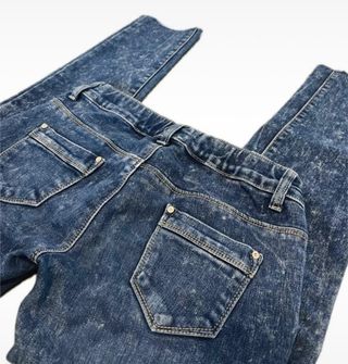 Pantalones tejanos desgastados