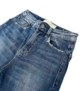 Pantalones tejanos desgastados