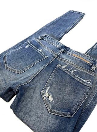 Pantalones tejanos desgastados