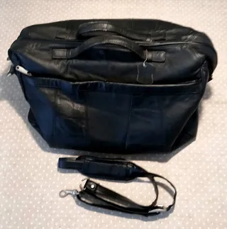 Bolsa antigua de cuero genuino y refuerzo metálico