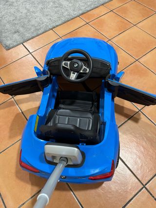 Coche niño azul con manillar
