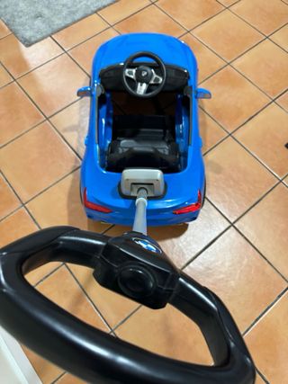 Coche niño azul con manillar