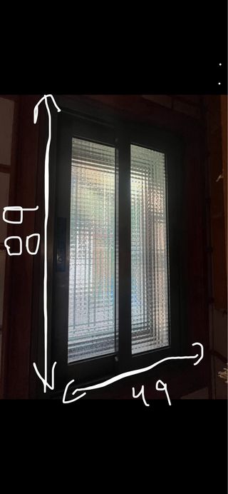 Ventana corredera de aluminio ocre