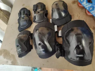 Patines con sus protecciones marca Oxelo Principia