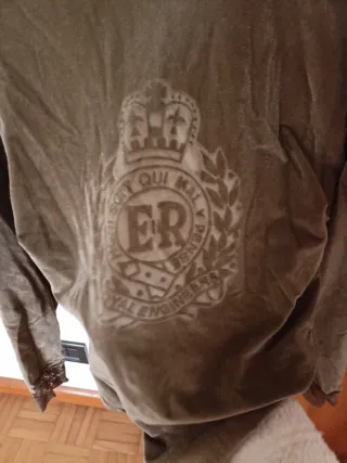 Body vintage marrone con stemma