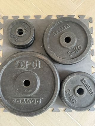 Set de pesas y barras gimnasio