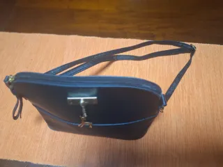 Pochette nera con ciondolo cervo