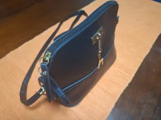 Pochette nera con ciondolo cervo