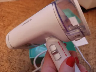 Plancha de vapor portátil para viaje.