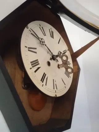 Reloj antiguo ojo de buey dorado pan de oro