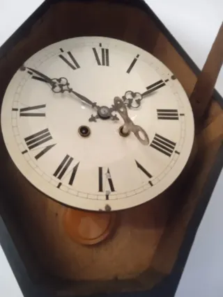 Reloj antiguo ojo de buey dorado pan de oro