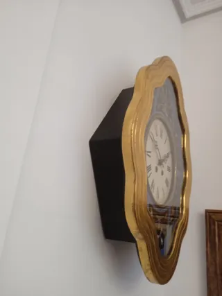 Reloj antiguo ojo de buey dorado pan de oro