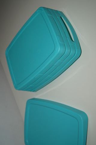 Caixa de arrumação azul em plástico