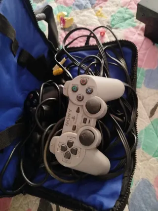 Ps2 Slim Negra con cables y maletín