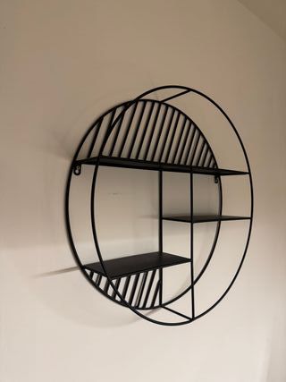 Estantería pared redonda metal negra