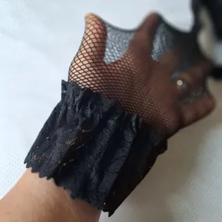 Body con giarrettiere e calze a rete