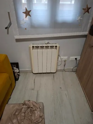 Radiador calor azul poco uso