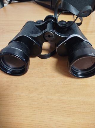Prismáticos antiguos con funda