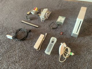 Wii, mandos y +100 juegos.