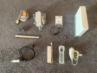 Wii, mandos y +100 juegos.