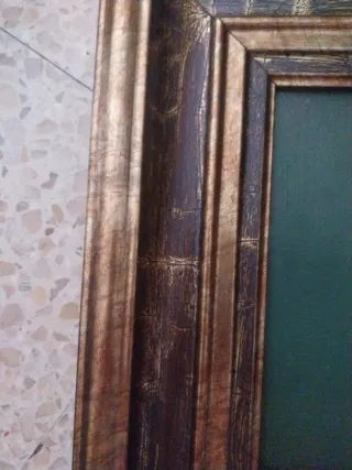 Due quadri ad olio su tela con cornici dorate