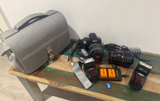 Sony A55 + Lente 16-105mm OSS y más extras