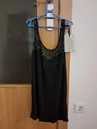 Camiseta negra con lentejuelas