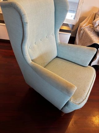 Sillón verde de tela