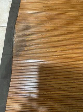 Alfombra de bambú con borde de tela