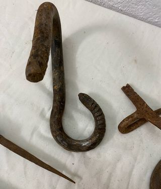 Conjunto de ganchos de hierro fundido
