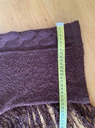 Poncho de punto con flecos