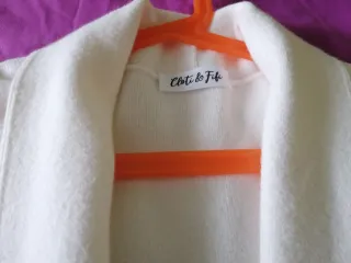 Chaqueta blanca con flecos