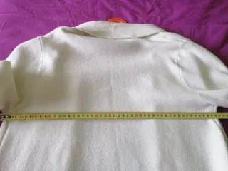 Chaqueta blanca con flecos