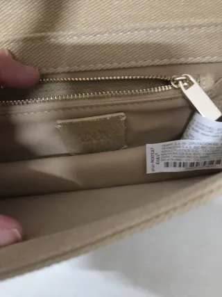 Bolso beige con flecos