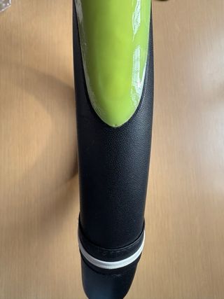 Coprivolante nero con inserti verdi e bianchi