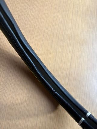 Coprivolante nero con inserti verdi e bianchi