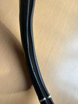 Coprivolante nero con inserti verdi e bianchi