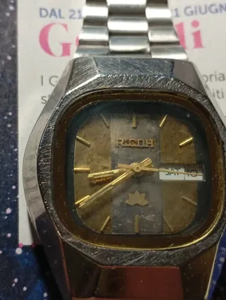 Orologio Ricoh oro e argento