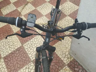 Bicicleta MTB Rockrider gris