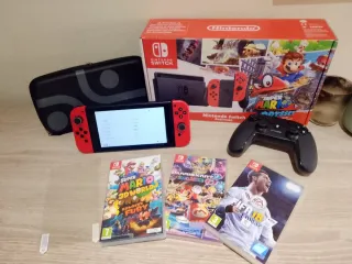Nintendo Switch + 4 juegos + accesorios